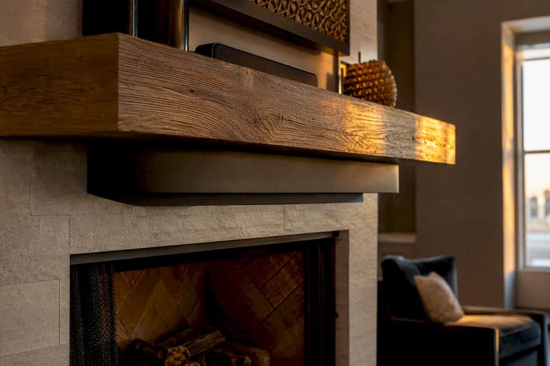 Close-up of deep fireplace mantel with integrated heat shield