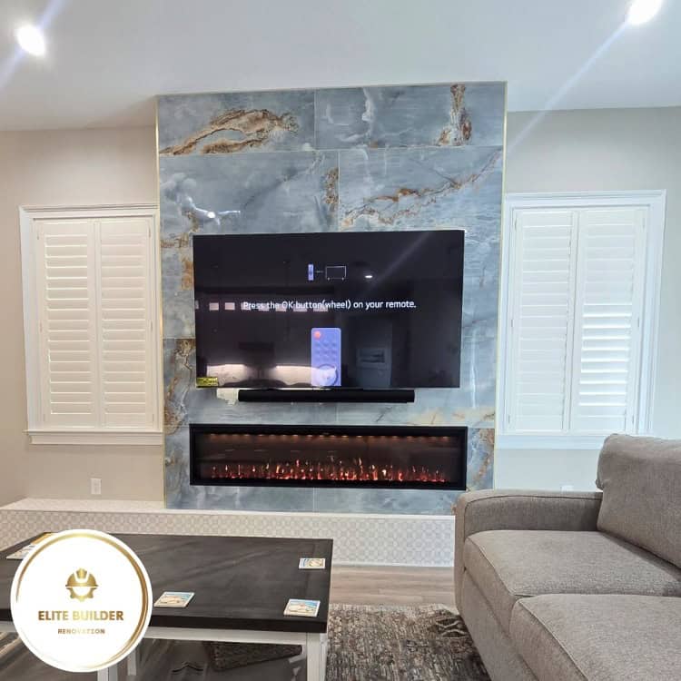 Fireplace remodel Tampa Bay: stone fireplace wall with a mounted television