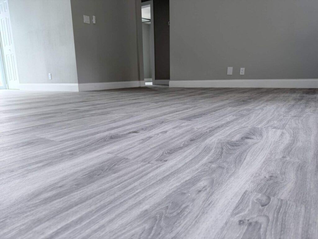 Flooring contractor Tampa Bay: finished living room floor laid wall to wall