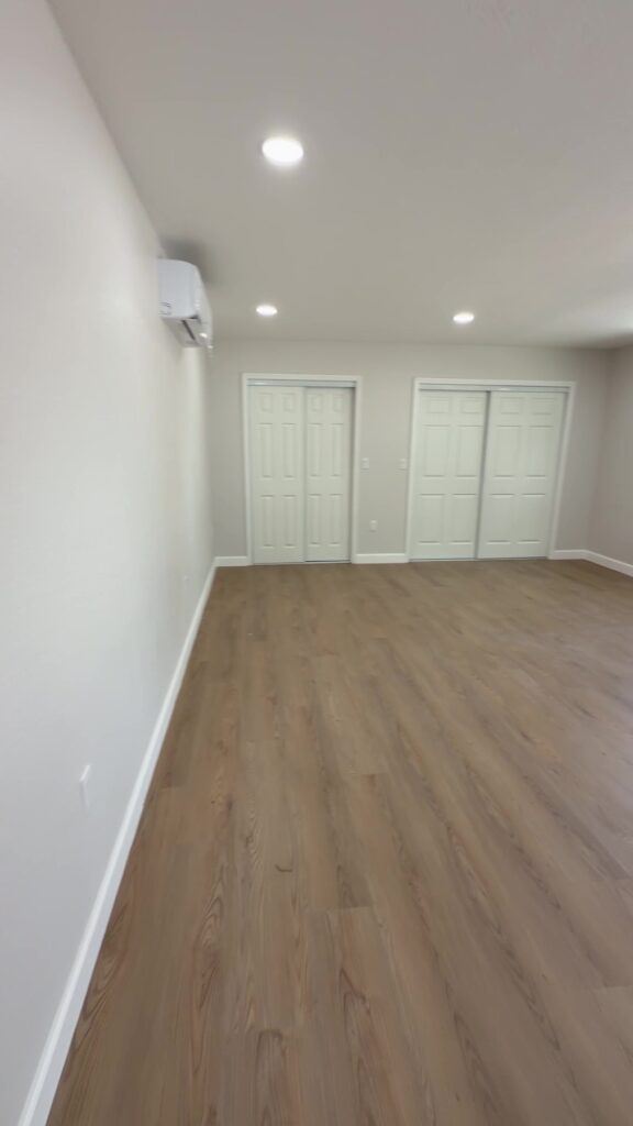 Garage conversion contractor Tampa Bay: converted garage with closets and conditioned air