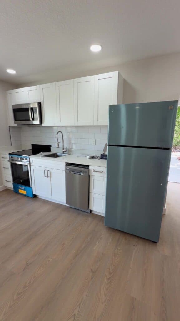 Garage conversion contractor Tampa Bay: full kitchen built into a converted garage