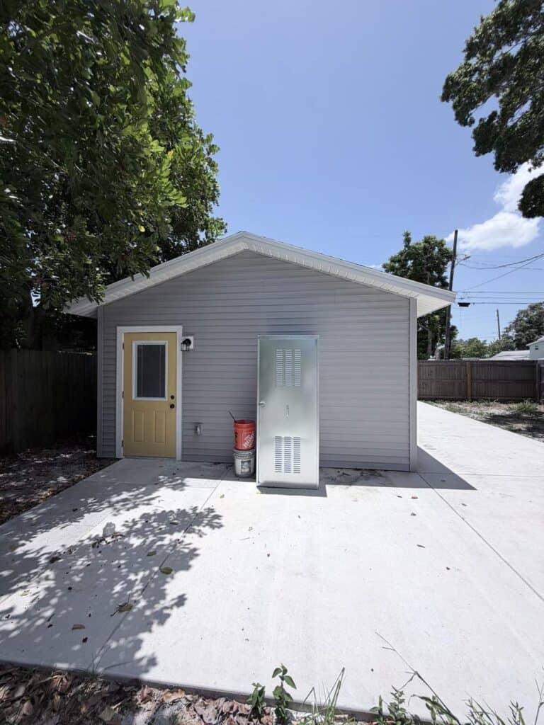 Garage conversion contractor Tampa Bay: finished conversion with its own entry door